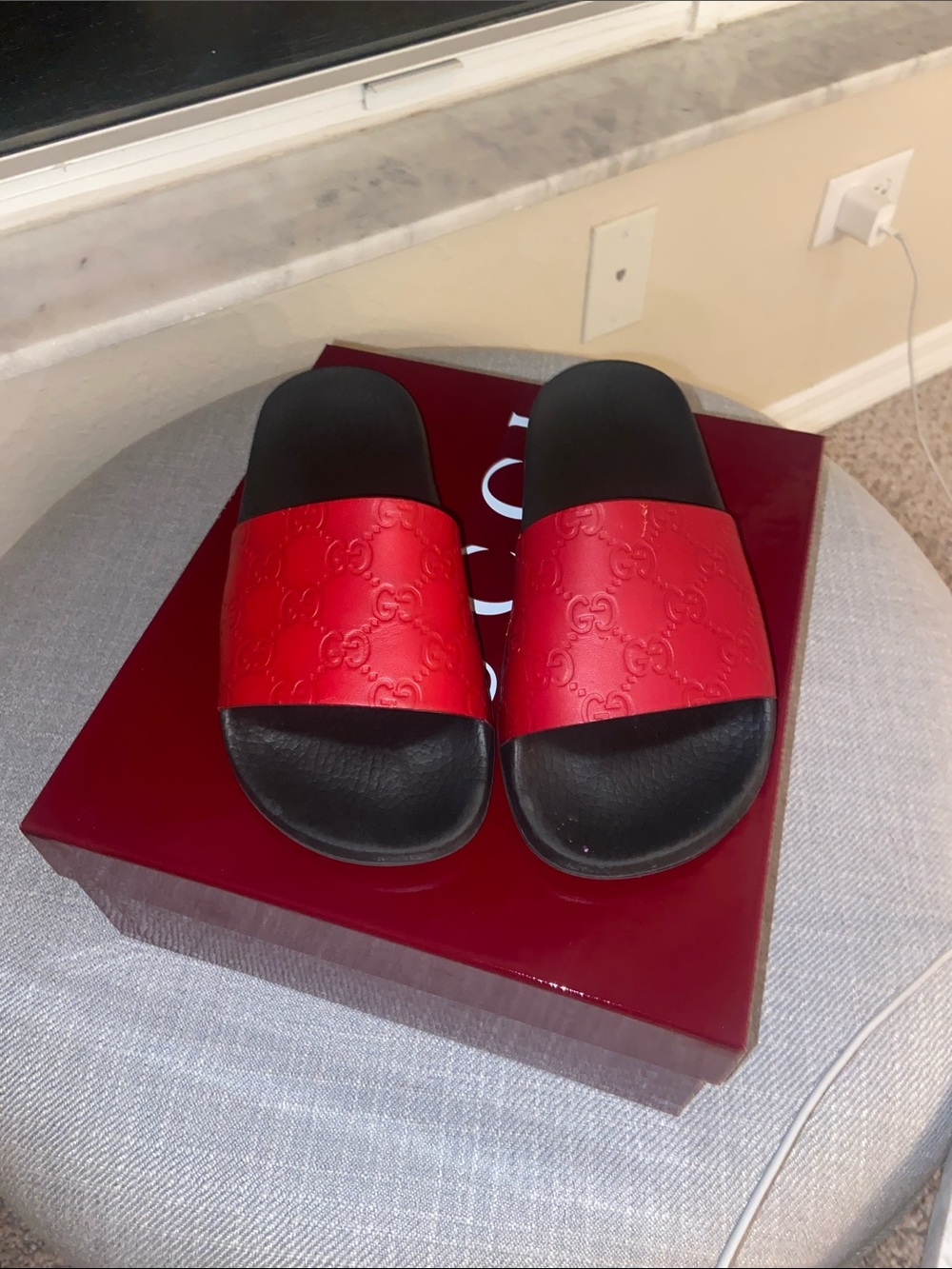 Gucci Red Embossed Logo Slide Sandals with Black Footbed